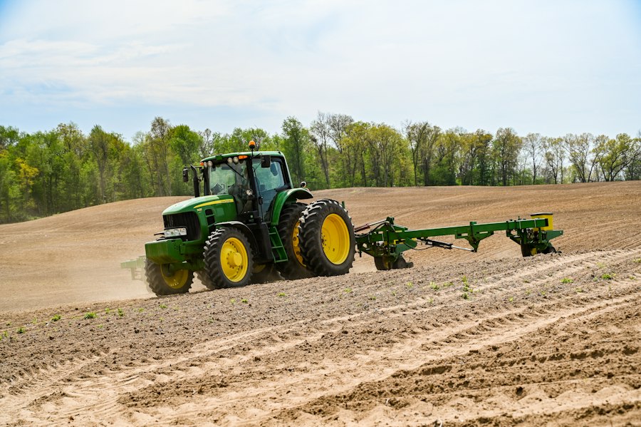 Tractor planting a field