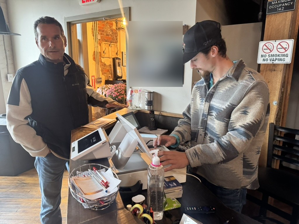 JadaPay team training staff on a new POS system at a local brewery